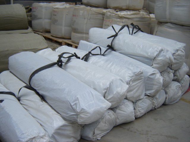 GCL15mm 180g No tejido 11000g Granula de bentonita 125g Tejido de tela de arcilla geosintética para impermeabilización 10